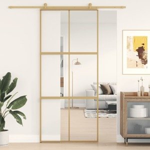 vidaXL Posuvné dvere zlaté 90x205 cm číre ESG sklo a hliník