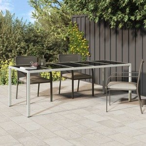 vidaXL Záhradný stôl biely 250x100x75 cm polyratan a tvrdené sklo
